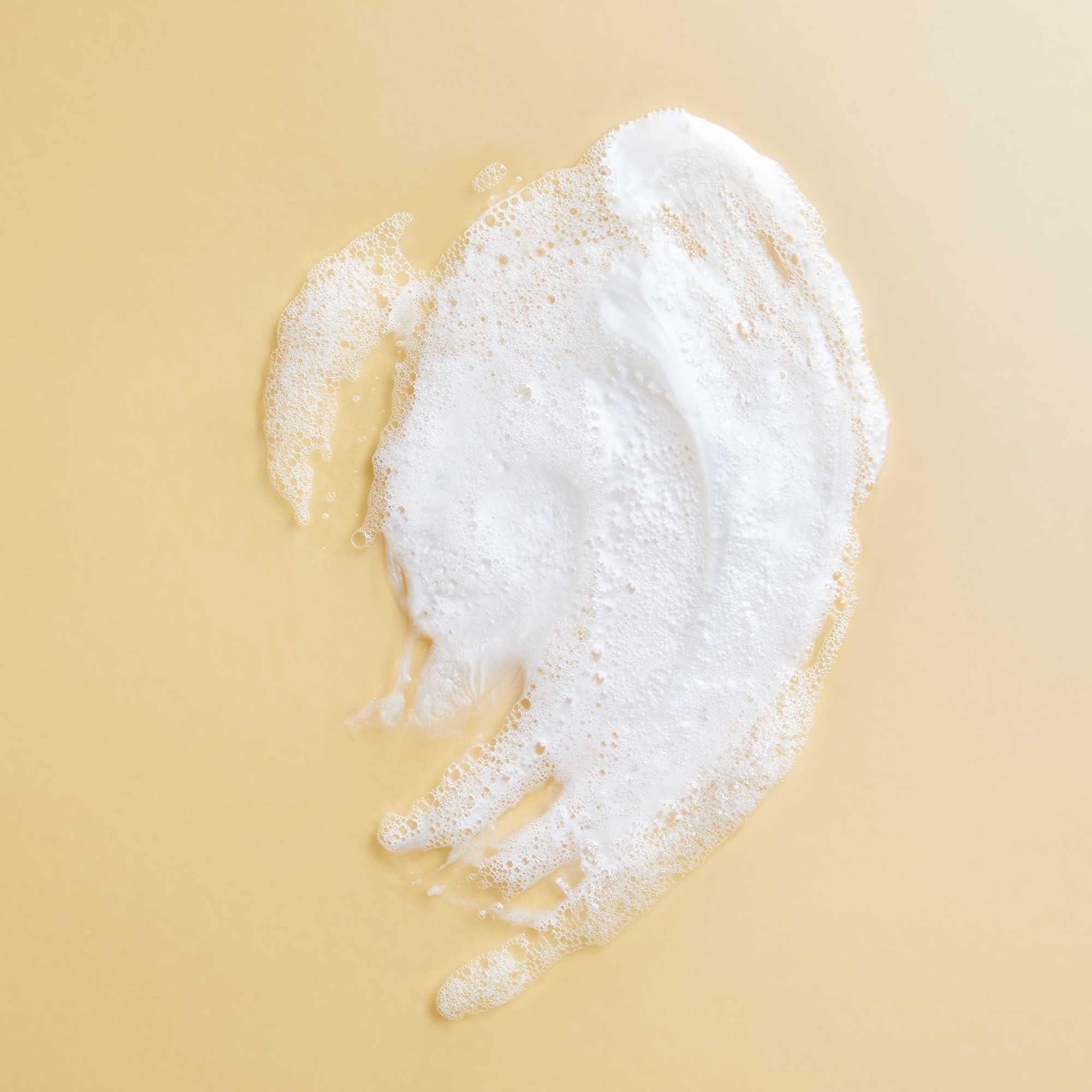 PATTERN Honey-Biotin-Oil blend on bottle highlights nourishing curls