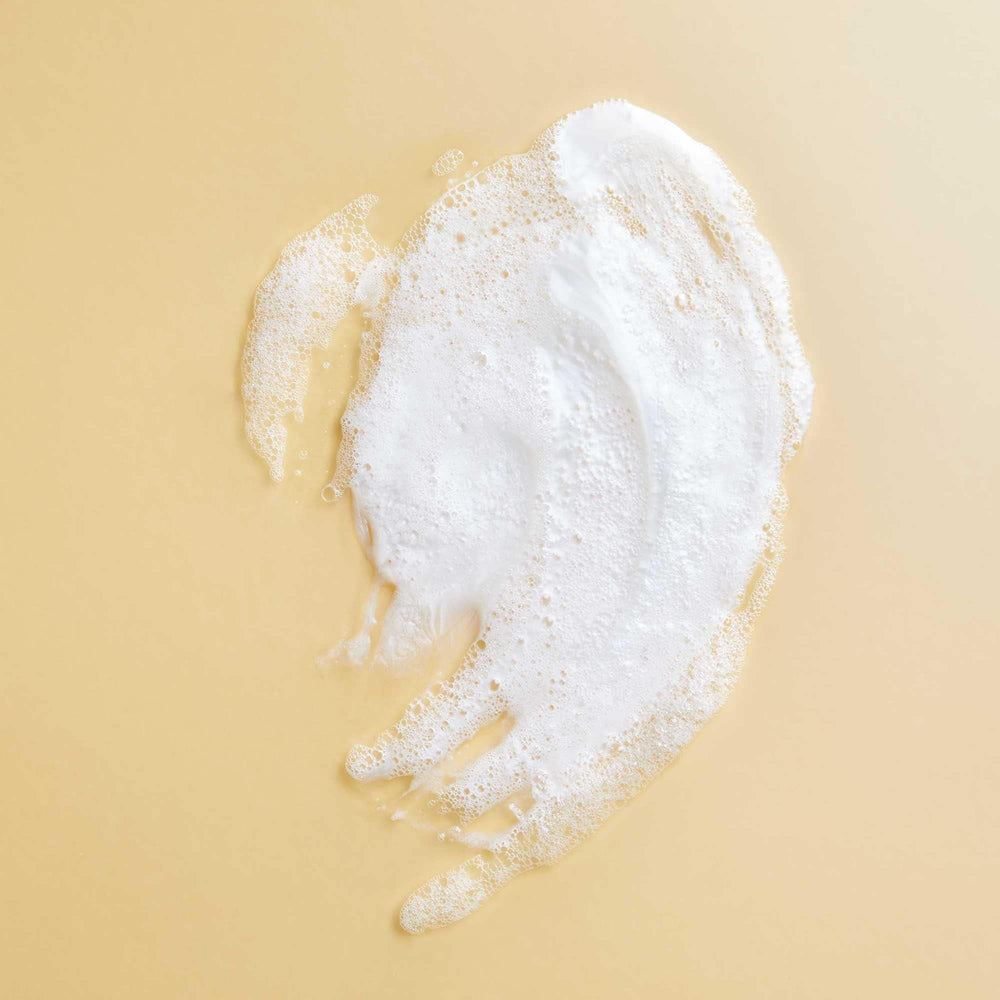 PATTERN Honey-Biotin-Oil blend on bottle highlights nourishing curls