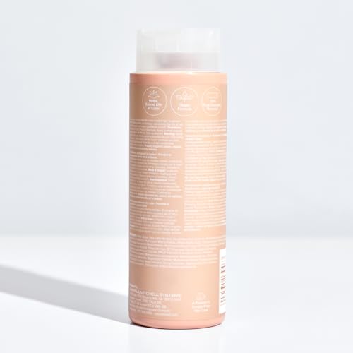Shiny color-treated hair after Color Protect conditioner enhances natural radiance