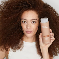Paul Mitchell Color Protect Shampoo on sunny shelf indicating color fade prevention