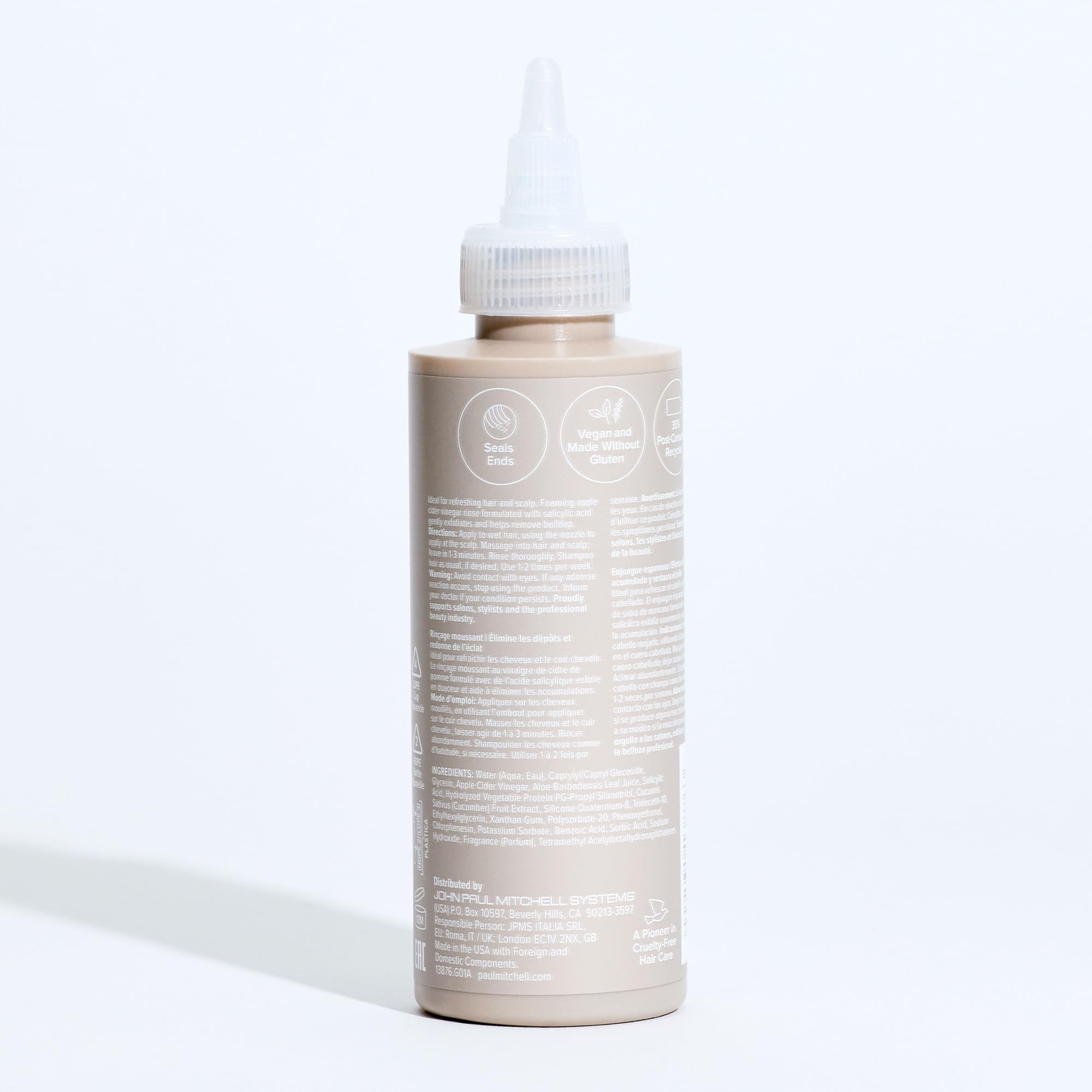 Paul Mitchell Foaming ACV Rinse product close-up shows texture
