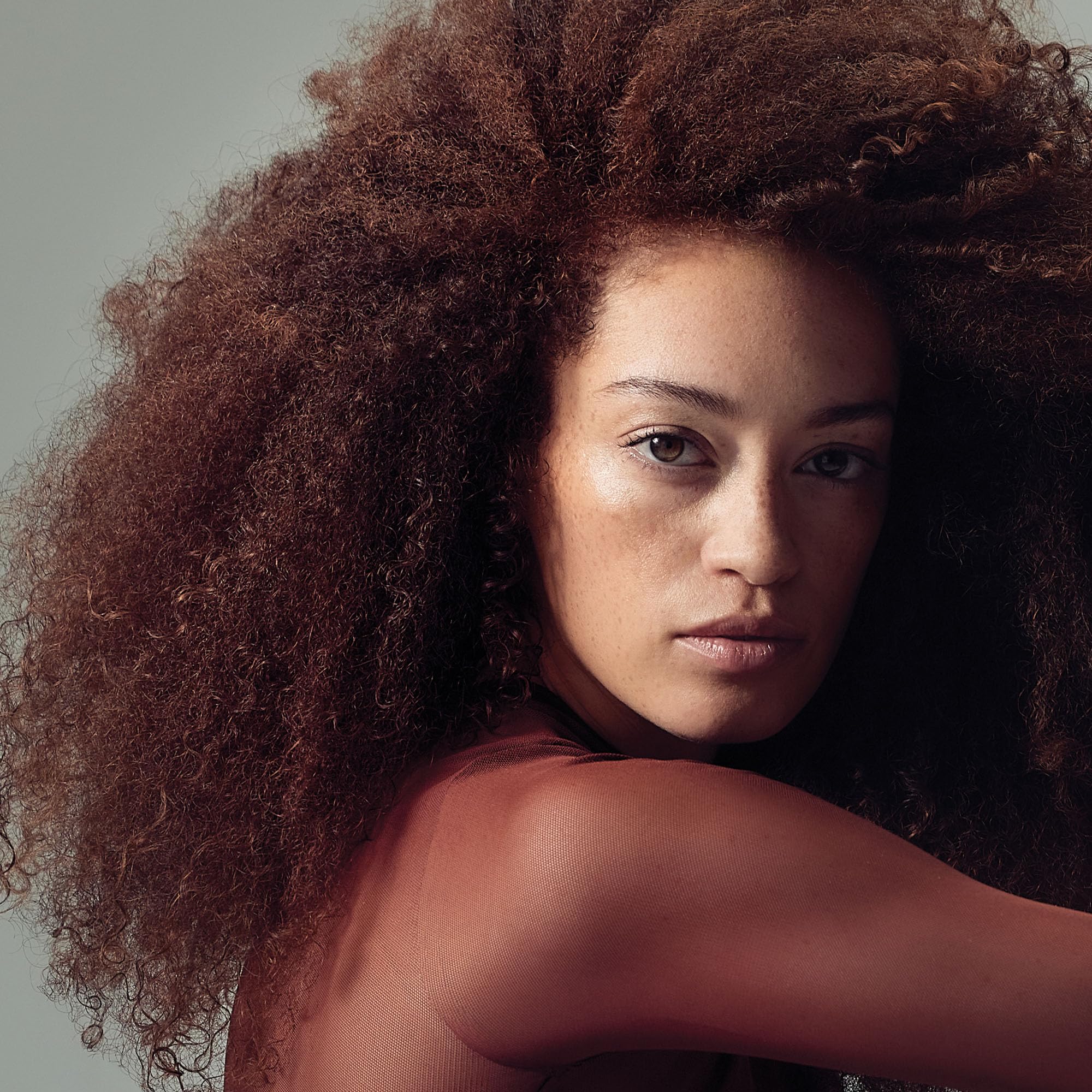 Paul Mitchell Foaming Pomade on wavy hair enhances texture and definition
