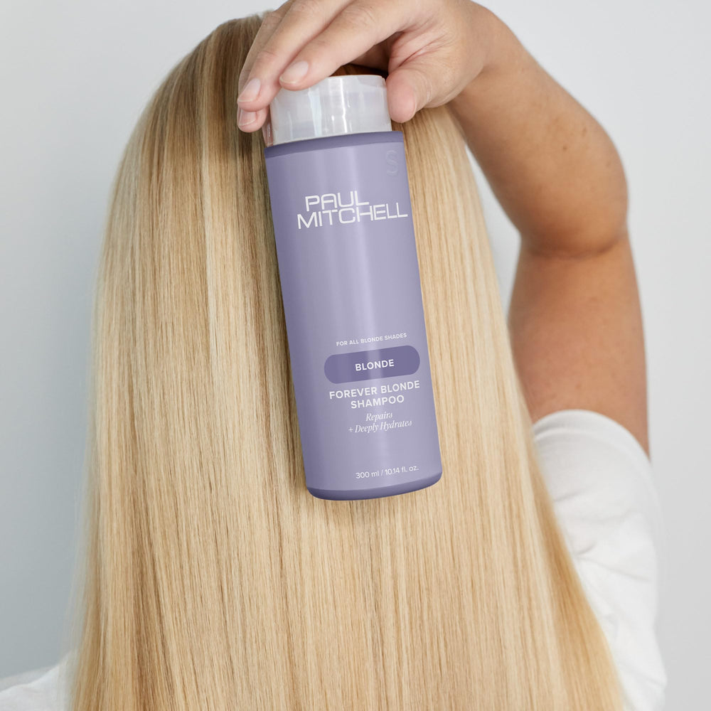 Paul Mitchell Forever Blonde Shampoo on shelf highlighting sustainable PCR packaging