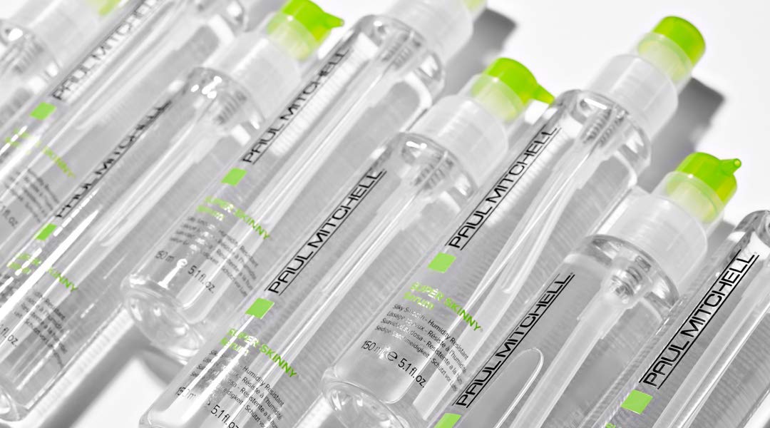 Paul Mitchell Super Skinny Serum applied to damp hair accelerates drying and smooths strands.