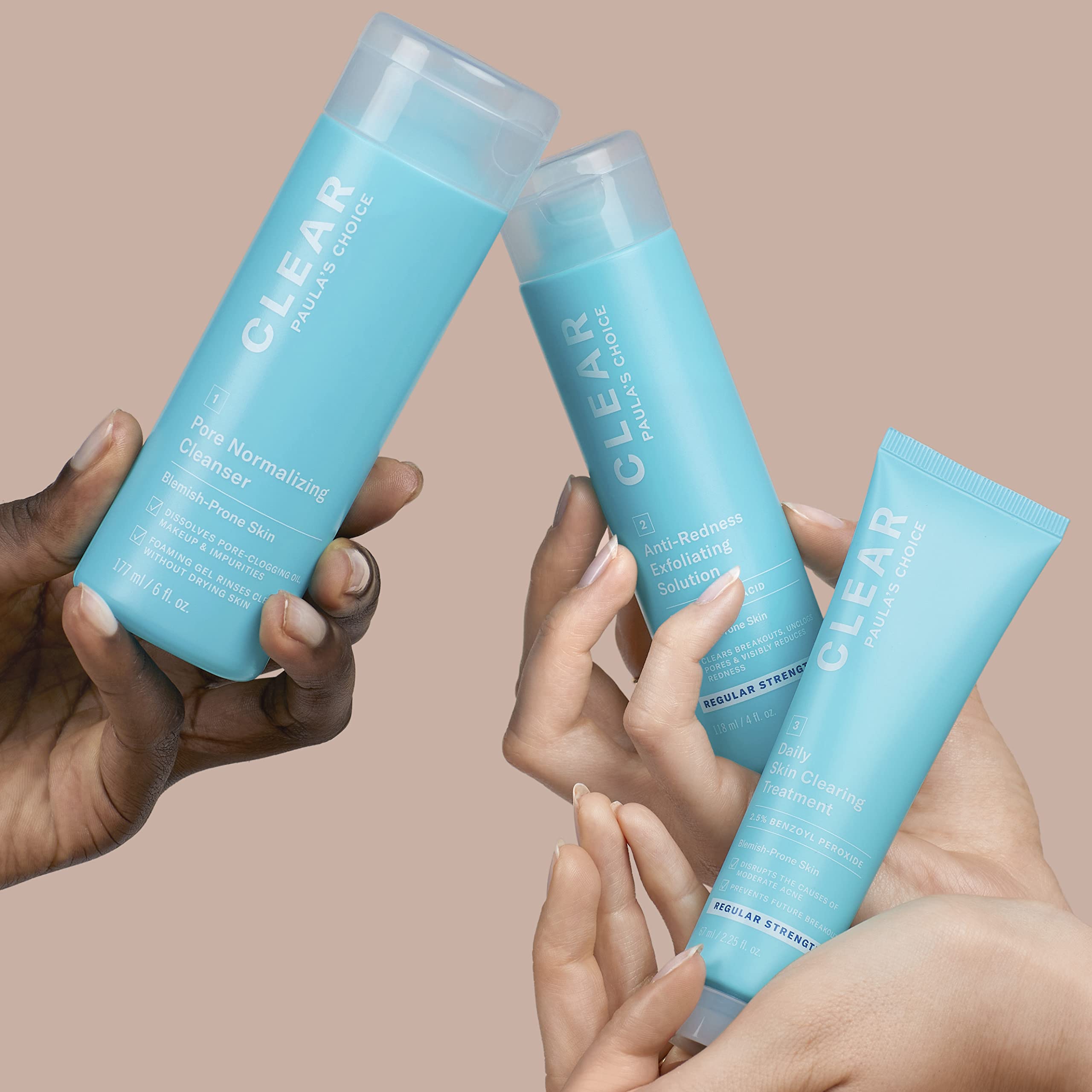 Paula's Choice CLEAR Regular Strength kit trio laid out for easy, beginner-friendly regimen.