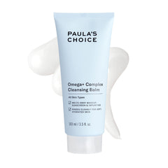 Paula's Choice Omega Complex cleansing balm in a jar closeup, melting makeup gently for clean skin.