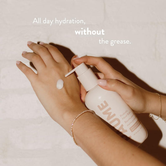 PAUME Probiotic Hand Balm on hands showing quick absorption