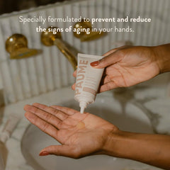 PAUME Renewing Hand Serum on hand shows fast absorption and moisture.