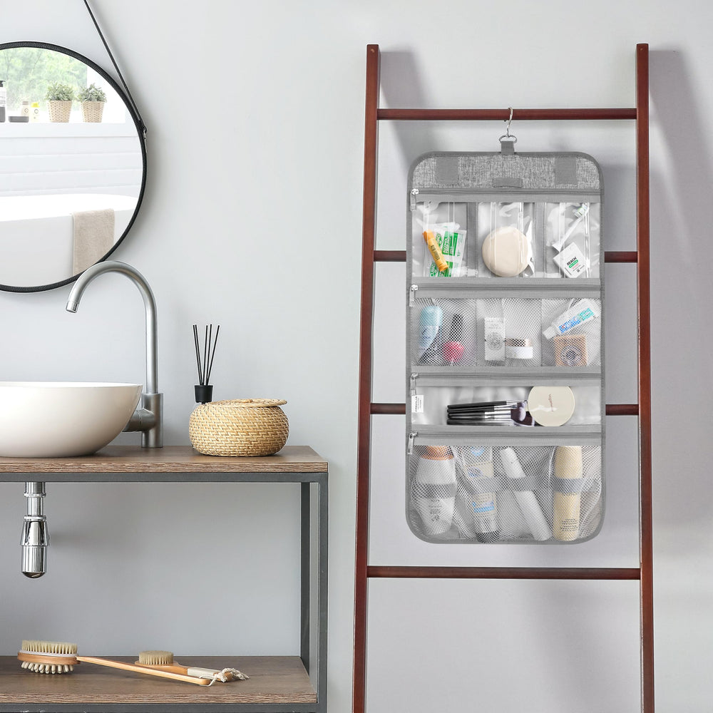 PAVILIA waterproof sections help separate wet items during trips.