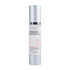 Peaches Skin Care hydrating moisturizer bottle on hand for daily use and lightweight hydration.