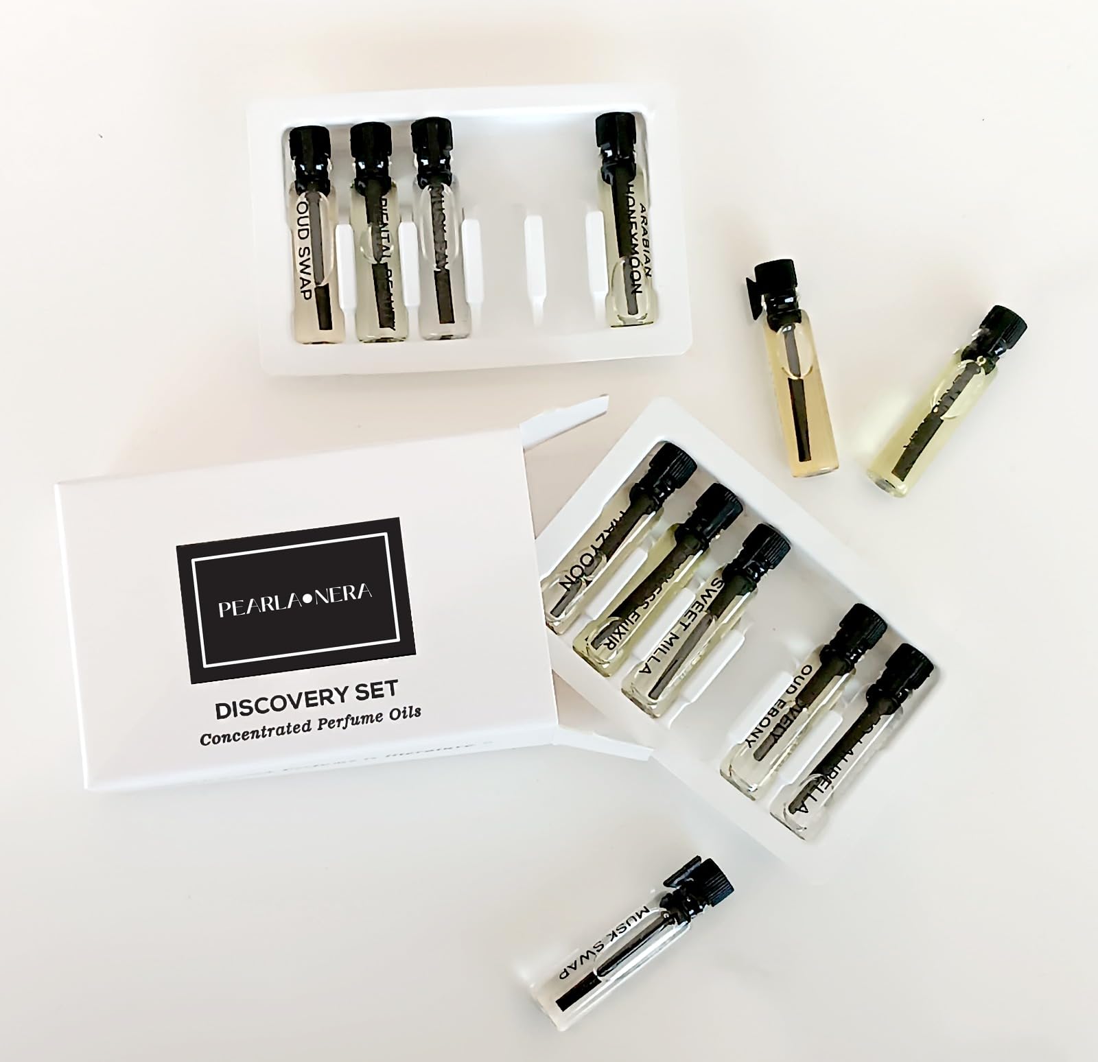 Pearlanera OUD SWAP discovery set packaging inviting fragrance exploration.