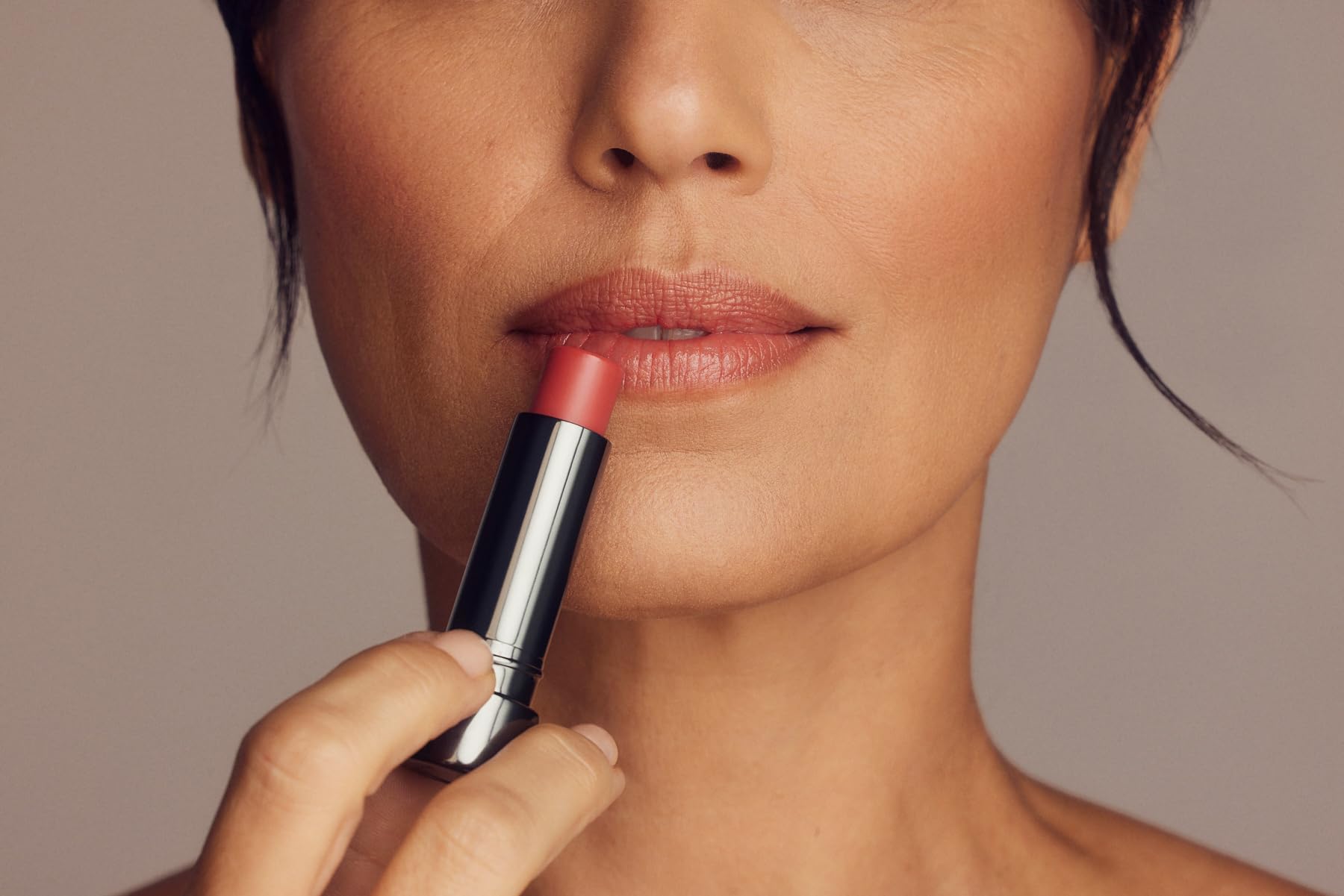 Perricone MD No Makeup Lipstick Original Pink being applied for a smooth, subtle color