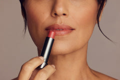 Perricone MD No Makeup Lipstick Original Pink being applied for a smooth, subtle color