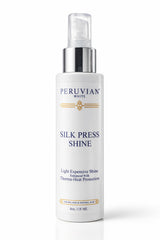 Peruvian White Silk Press bottle pour demonstrates easy spray application for styling
