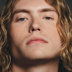 Peter Dundas tinted moisturizer caffeine helps de-puff