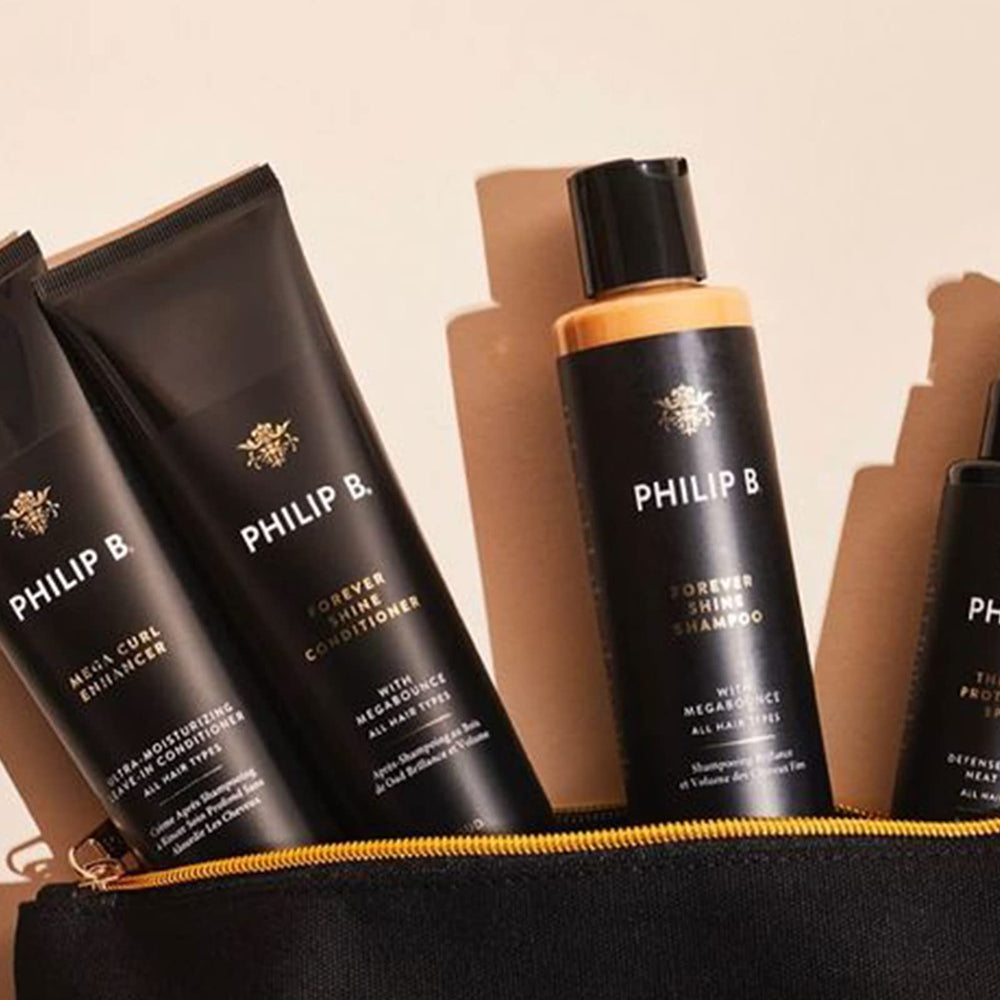 PHILIP B Forever Shine Shampoo packaging shot emphasizing luxury branding for gift-worthy presentation