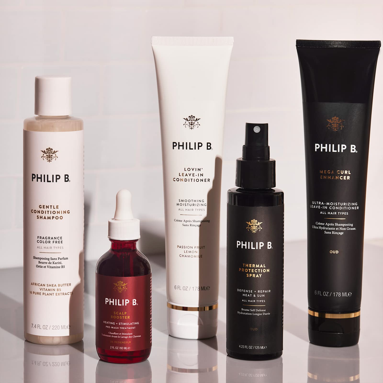 PHILIP B Thermal Protection Spray travel-size bottle for on‑the‑go styling.