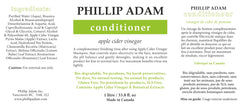 Phillip Adam lifestyle shot shows fresh, vegan, paraben-free haircare set on bathroom shelf