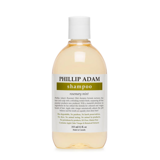 Phillip Adam Rosemary Mint Shampoo bottle shows label for refreshed scalp and shine.