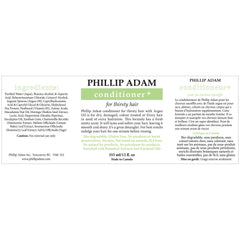 Phillip Adam Thirsty Hair Conditioner label close-up shows vegan, paraben-free formula for healthier hair