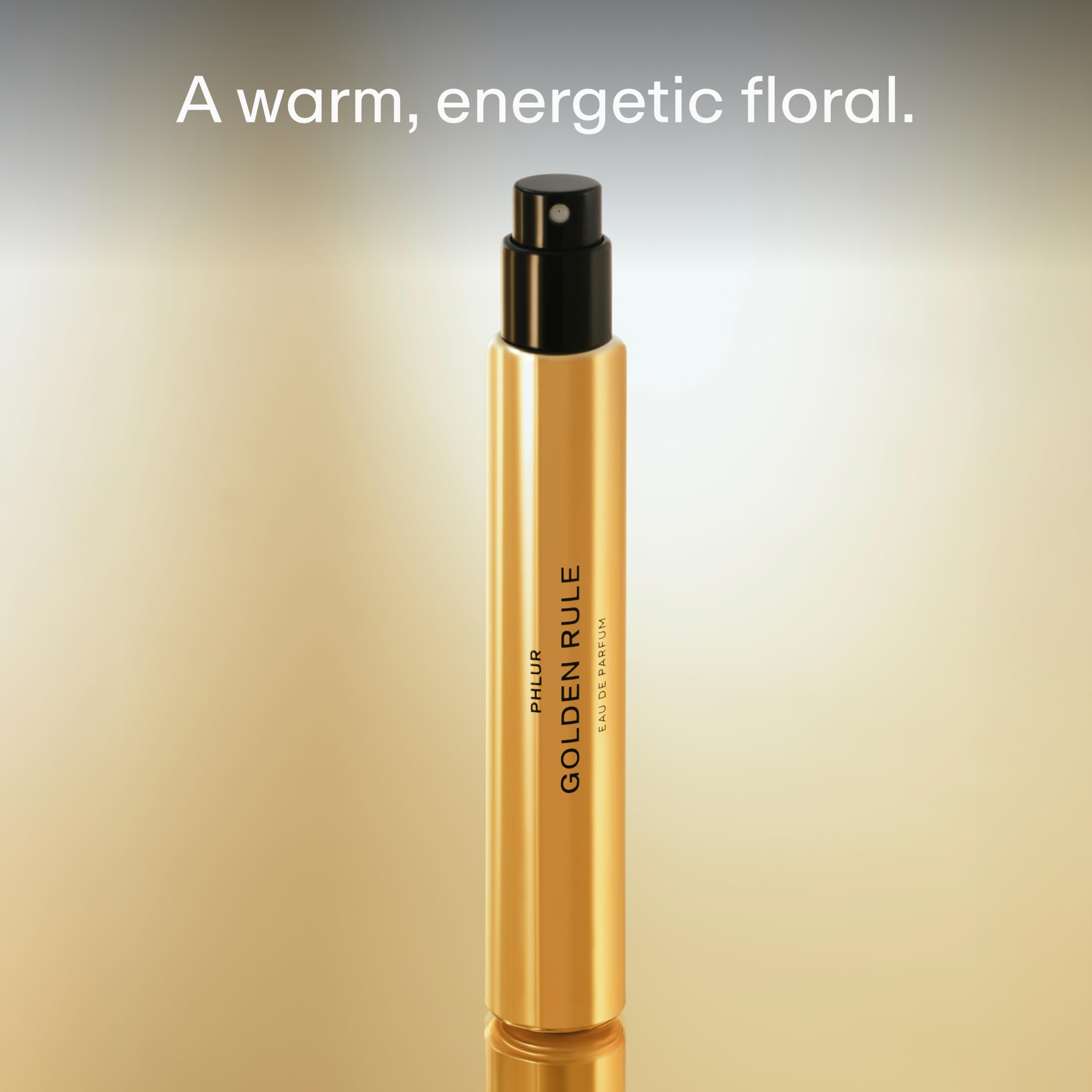 PHLUR Golden Rule travel-size 9.5 mL fits bags and purses for on-the-go fragrance.