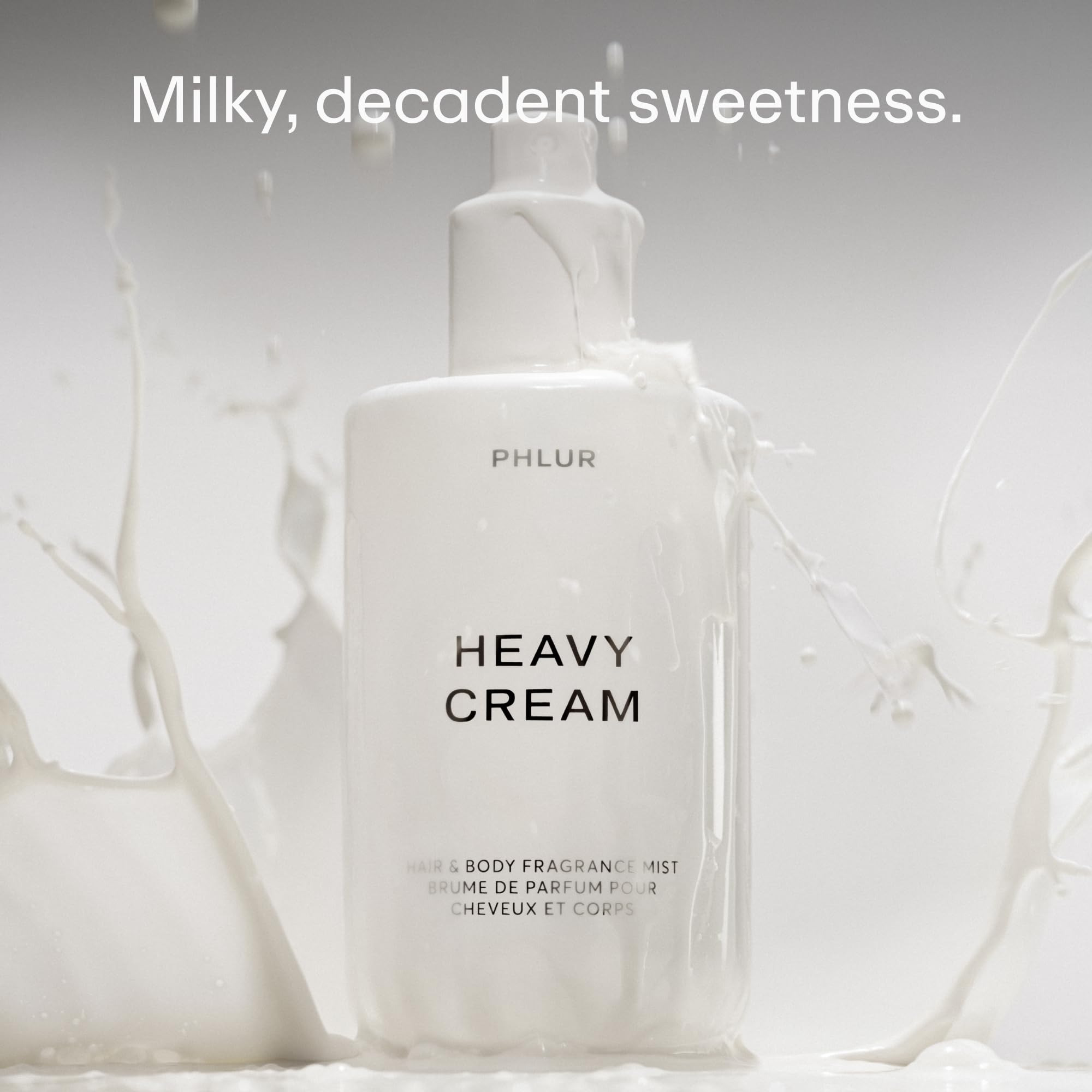 PHLUR Heavy Cream spray mist—gentle, all-over application for lightweight daily fragrance.