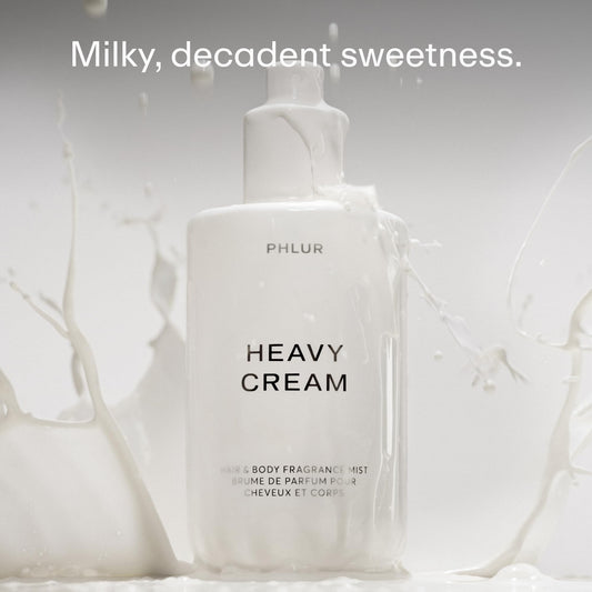PHLUR Heavy Cream spray mist—gentle, all-over application for lightweight daily fragrance.