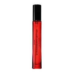 PHLUR Strawberry Letter bottle with magnetic lid, showcasing chic packaging and reduced plastics.