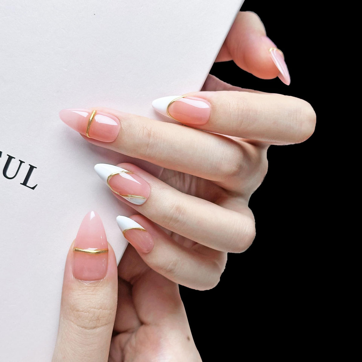 PHYLIN LEAF handmade press-on nails in medium almond shape with pink and gold border for chic everyday style.