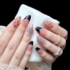 PHYLIN LEAF medium almond oval nails featuring French tips for elegant elongation.