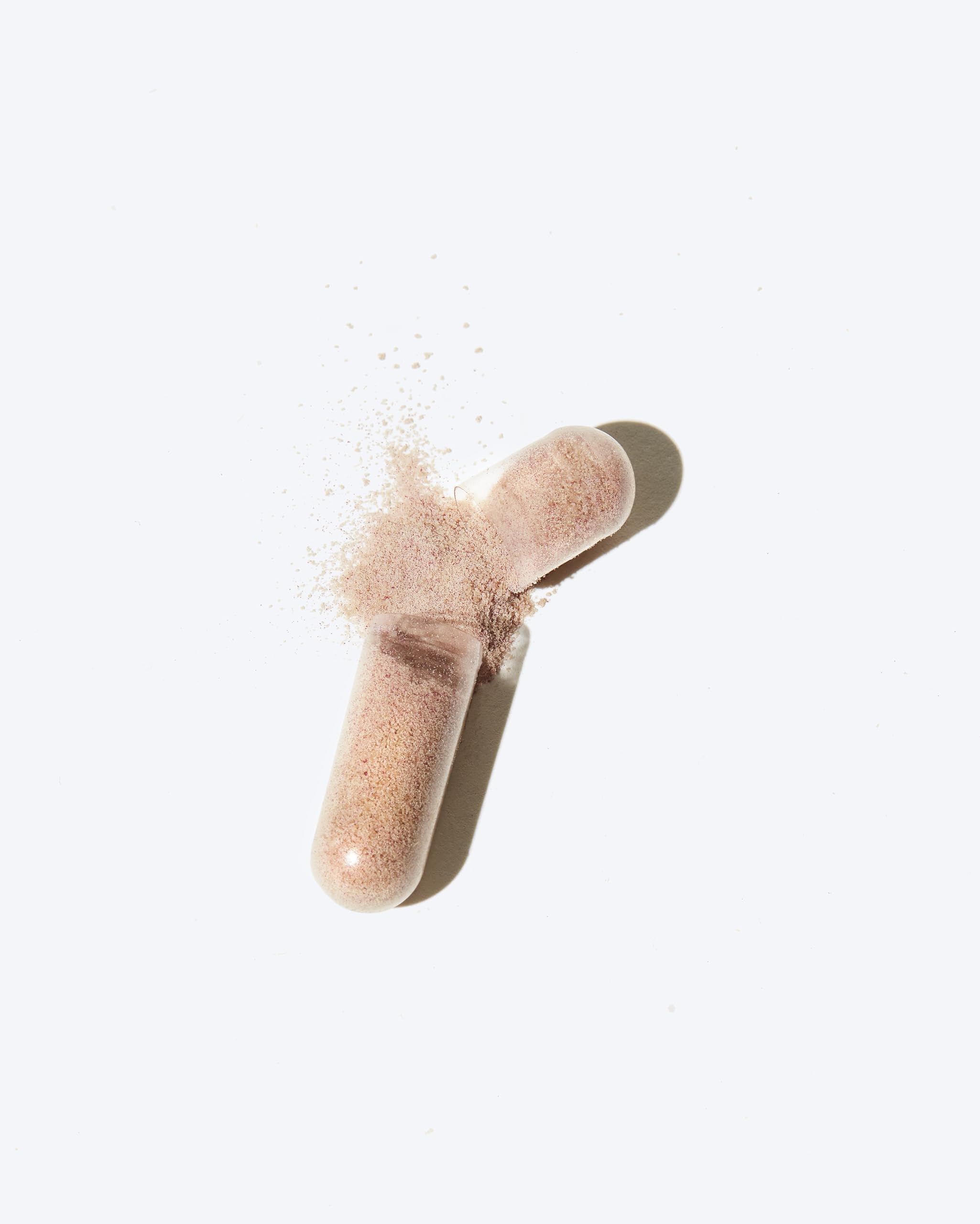 PHYTOCYANE capsules closeup illustrating small, easy-to-swallow daily dose.