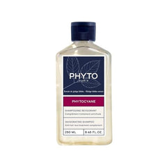 PHYTOPHYTOCYANE bottle pour demonstrates easy daily application for scalp care.