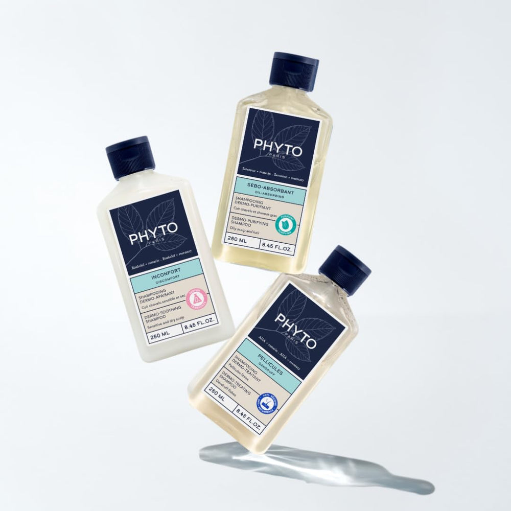 PHYTO Scalp Solutions Dandruff Shampoo lather closeup conveys gentle cleansing action.