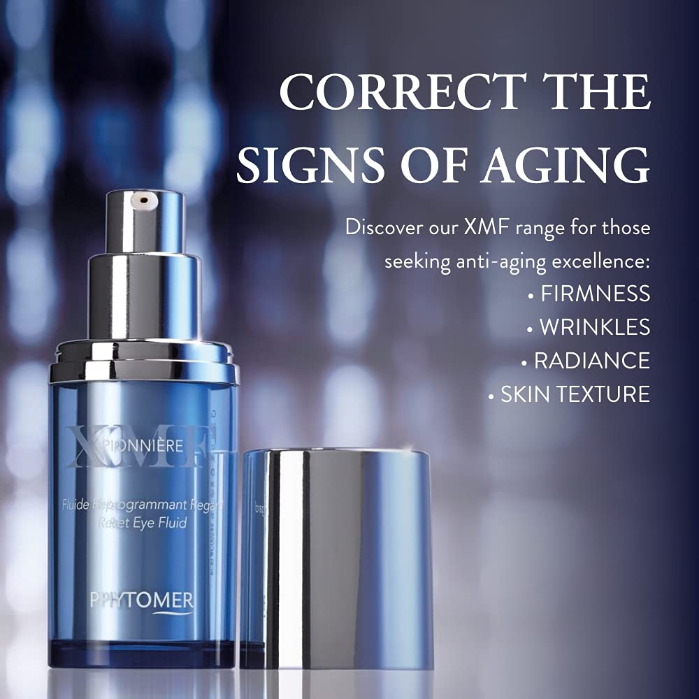 Phytomer Pionnière XMF Reset Eye Cream on fingertip showing light emulsion.