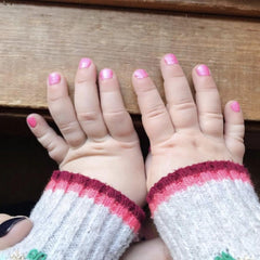 Nail art accessories and polishes shown for easy kid-friendly customization.