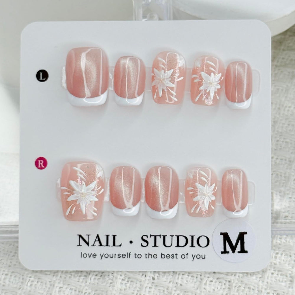 Pink sparkling accent nails add a playful glow for evenings out.