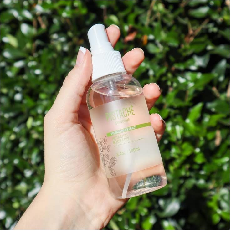 User applying mist post-shower for hydration refresh.