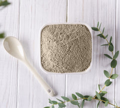 Plant Guru Bentonite clay texture closeup highlights a fine powder ideal for masks.