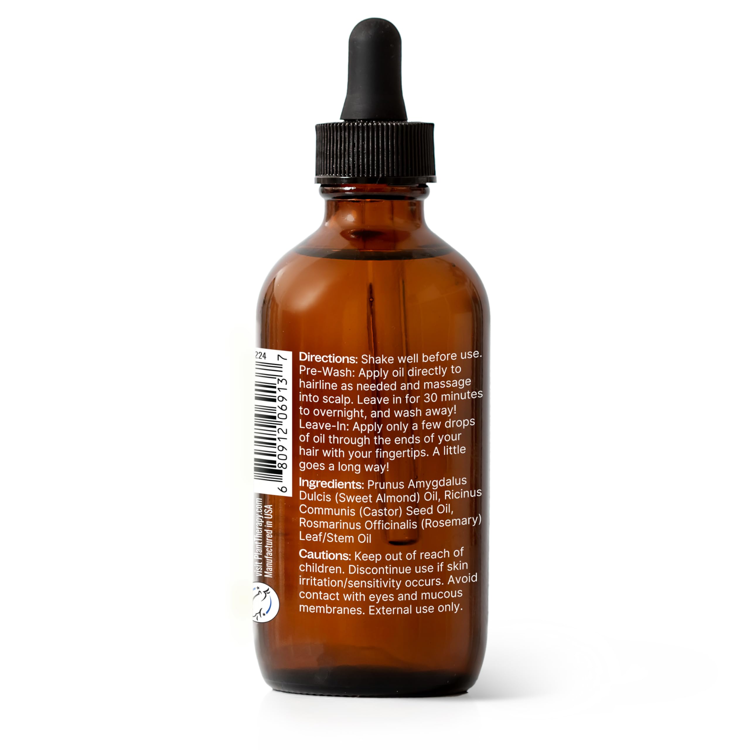 Plant Therapy oil on scalp for nourishing roots and shine.