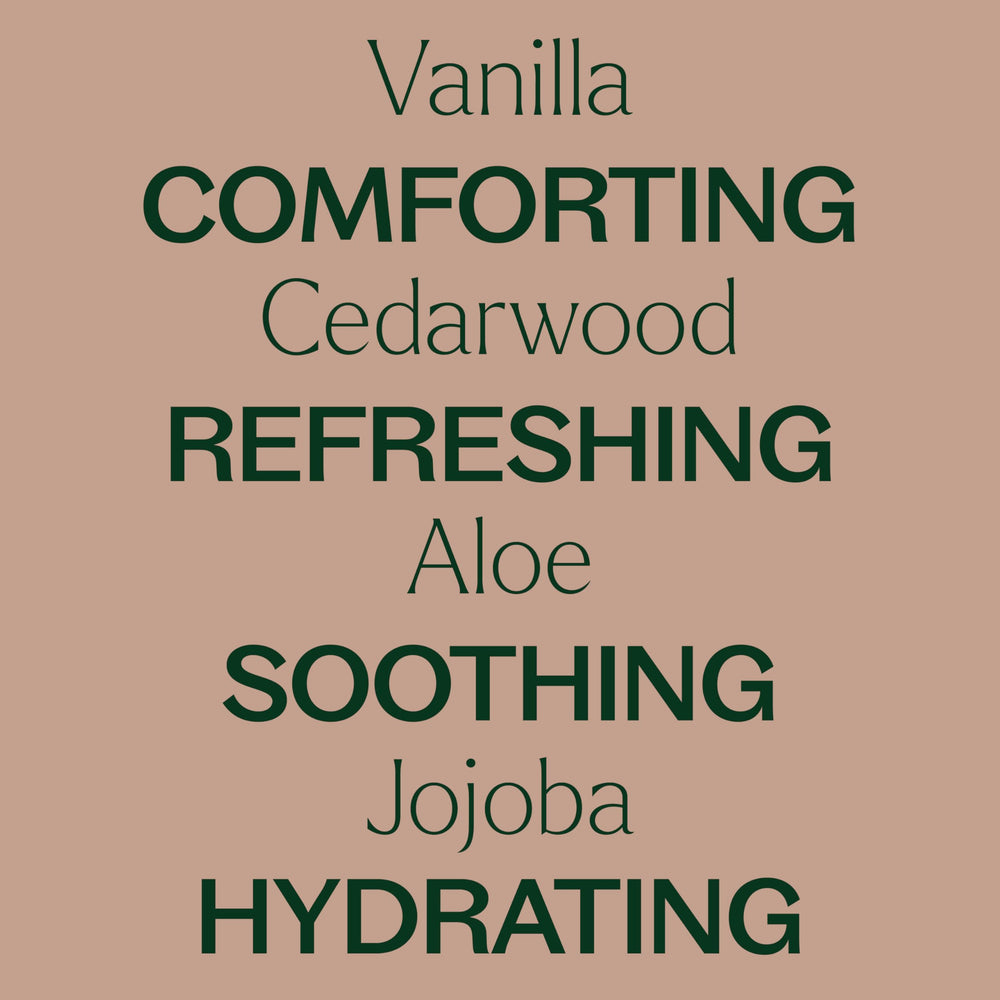 Close-up of Vanilla Woods ingredients including aloe, vitamin E, and jojoba.