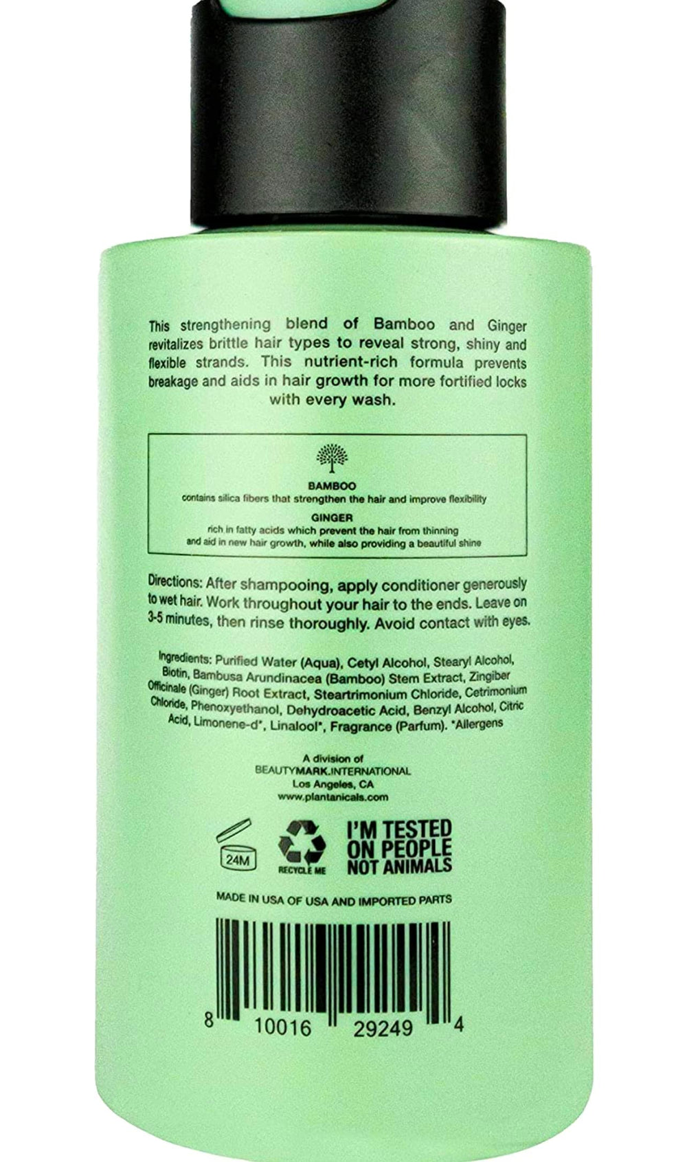 Closeup of Plantanicals conditioner bottle label featuring bamboo and ginger for daily conditioning.