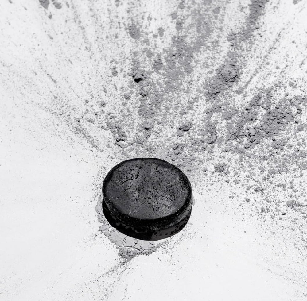 Plantmade shampoo bar with charcoal and rosemary detoxes the scalp for a refreshed feel.