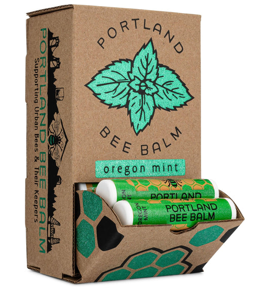 Close-up of Portland Bee Balm handmade beeswax formula emphasizing natural moisture.