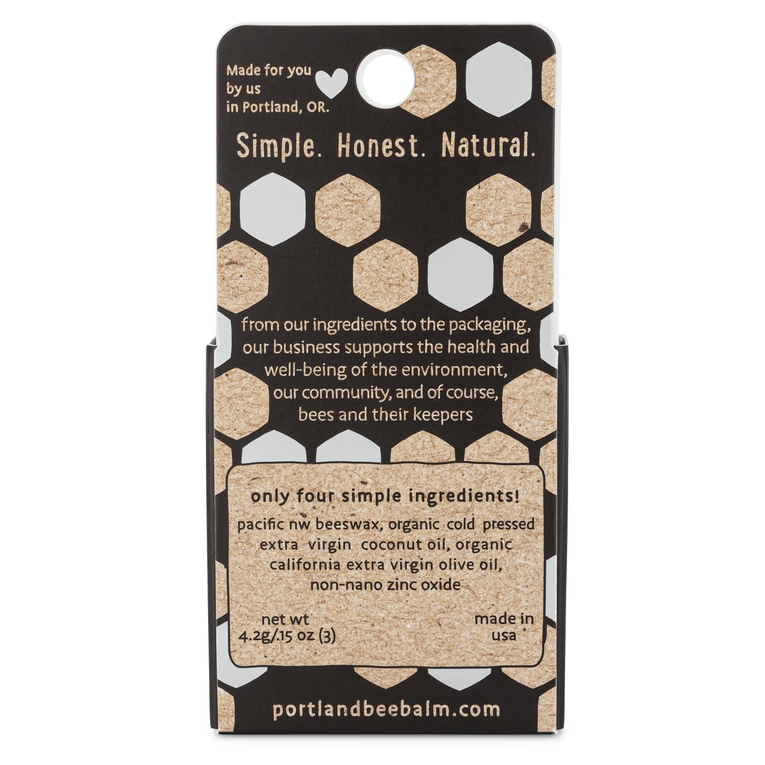 Portland Bee Balm natural ingredients closeup shows pure beeswax formula.