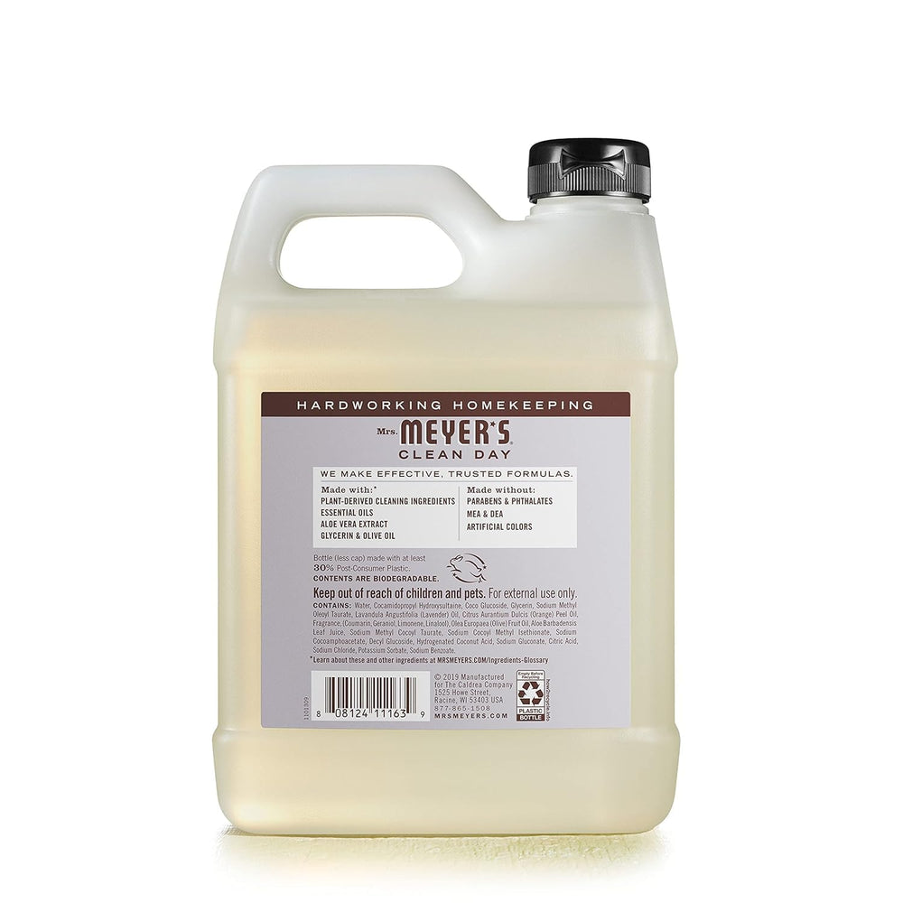 Refill bottle being poured, promoting easy use and reduced waste.