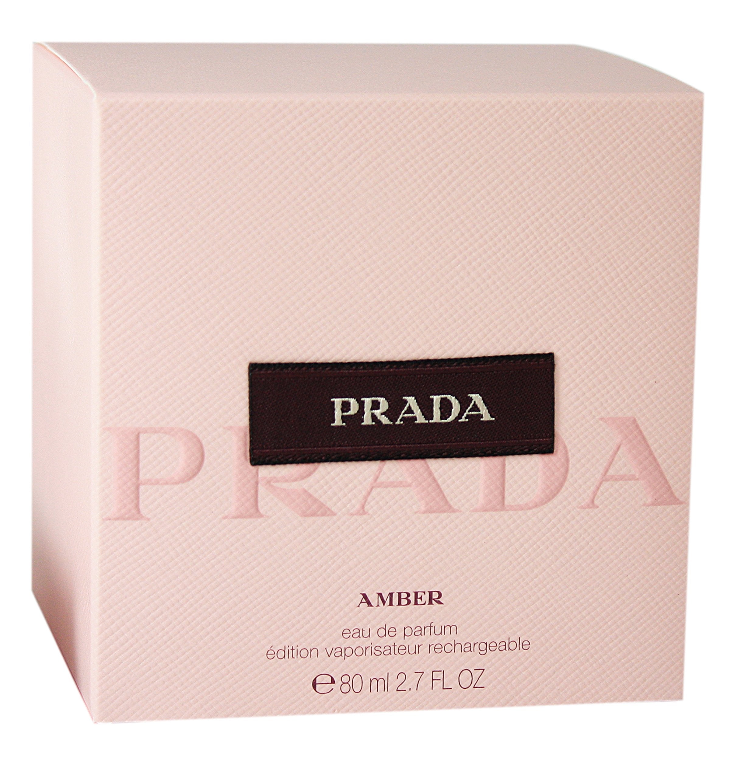 Prada Amber by Prada spray bottle emphasizes warm amber notes for evening wear.