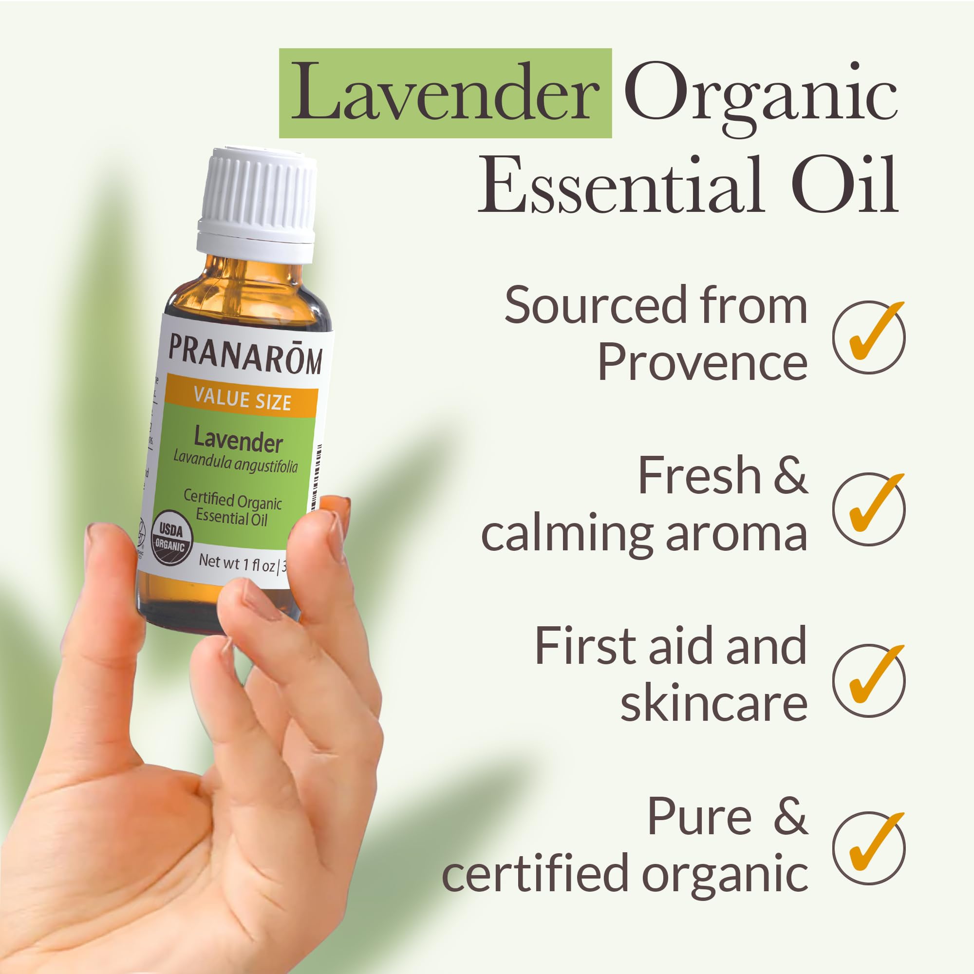 Pranarom Lavender Oil on skin for soothing blemishes and gentle skincare use.