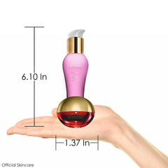 Premier Dead Sea BIOX Serum dispense action captured for controlled application.