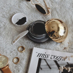 Premier Miracle Noir Mask face application suggests even coverage and gentle feel