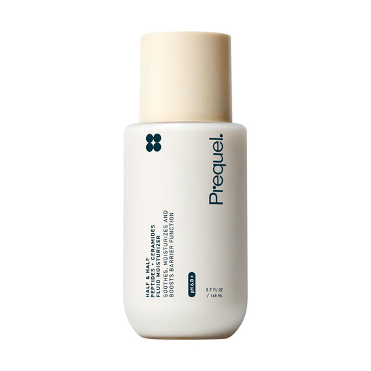 Prequel Skin Half and Half bottle in hand, showcasing a smooth emulsion for hydrated skin.